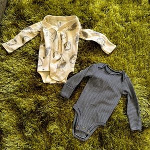 2 newborn NWOT long sleeve onesies.